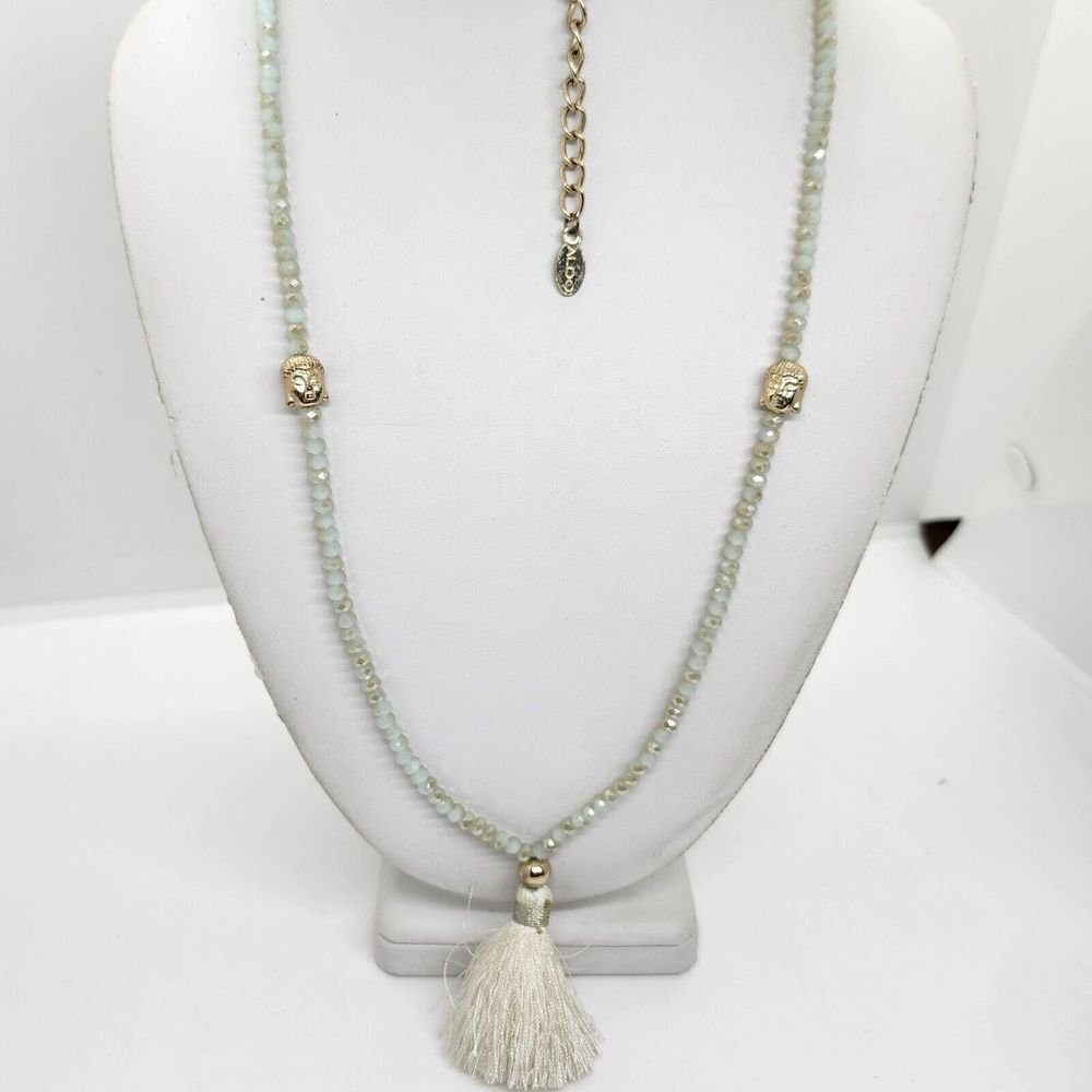 Aldo Sea Foam Crystal Buddha Tassel‎ Necklace